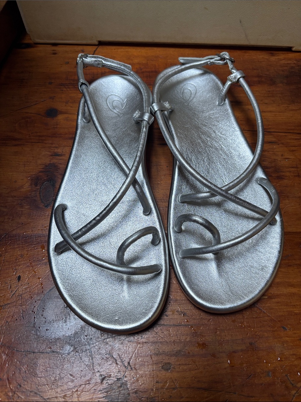 OluKai Metallic Silver Strappy Flat Sandals